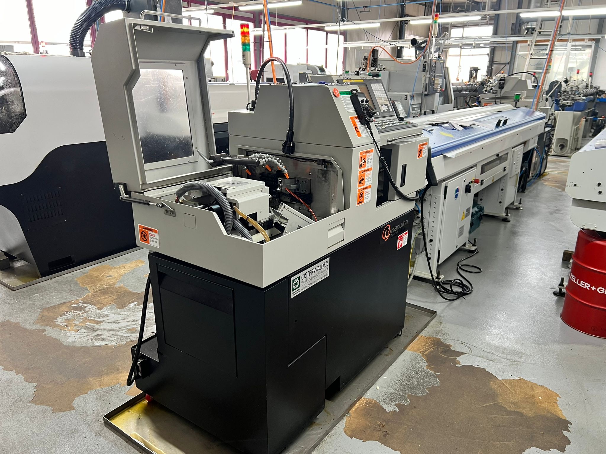 Tour CNC à poupée mobile 4 axes - HANWHA